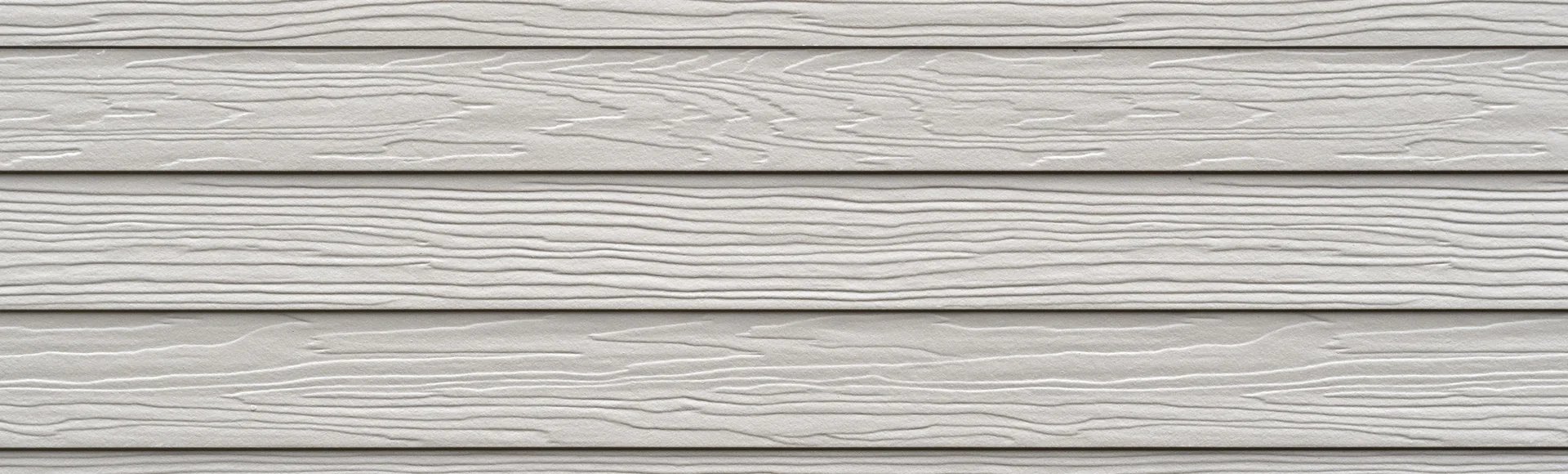 Painted horizontal lap siding on a home exterior