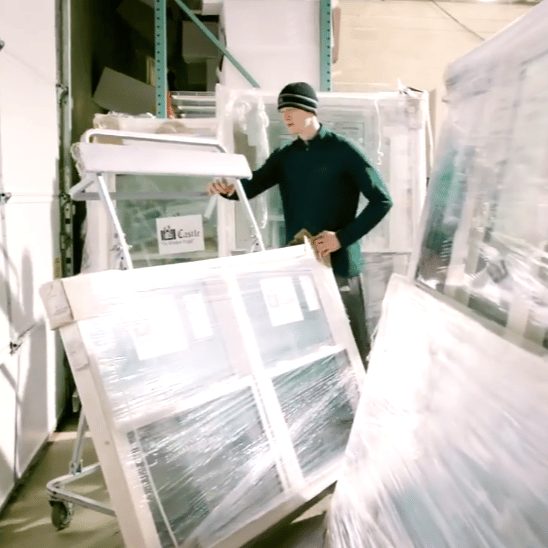 man pushing windows
